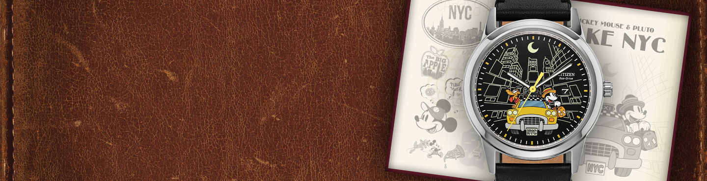 Women's Disney Watches; Featuring Mickey Mouse & Pluto Take NYC watch model AW1860-01W on a leather background