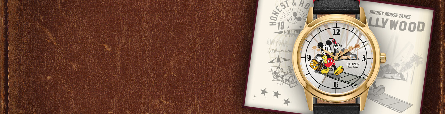 Women's Disney Watches; Featuring Mickey Mouse Takes Hollywood watch model FE7063-07W on a leather background