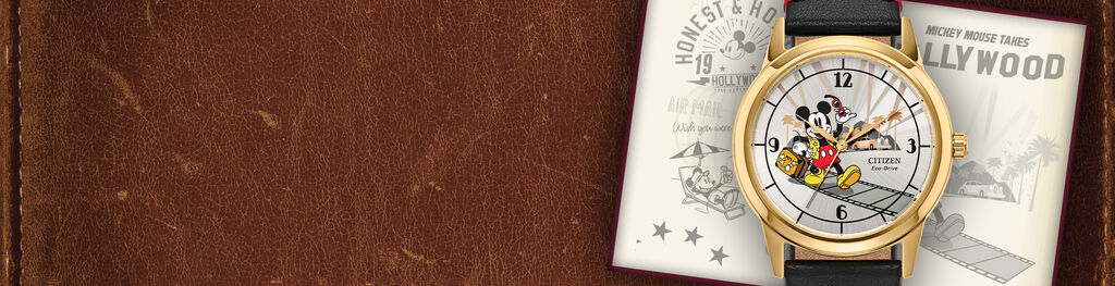 Women's Disney Watches; Featuring Mickey Mouse Takes Hollywood watch model FE7063-07W on a leather background